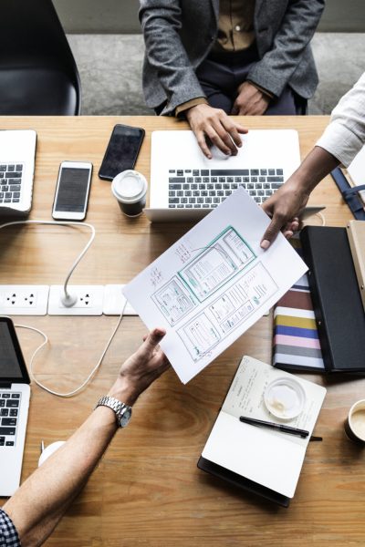 Group of people working on website template